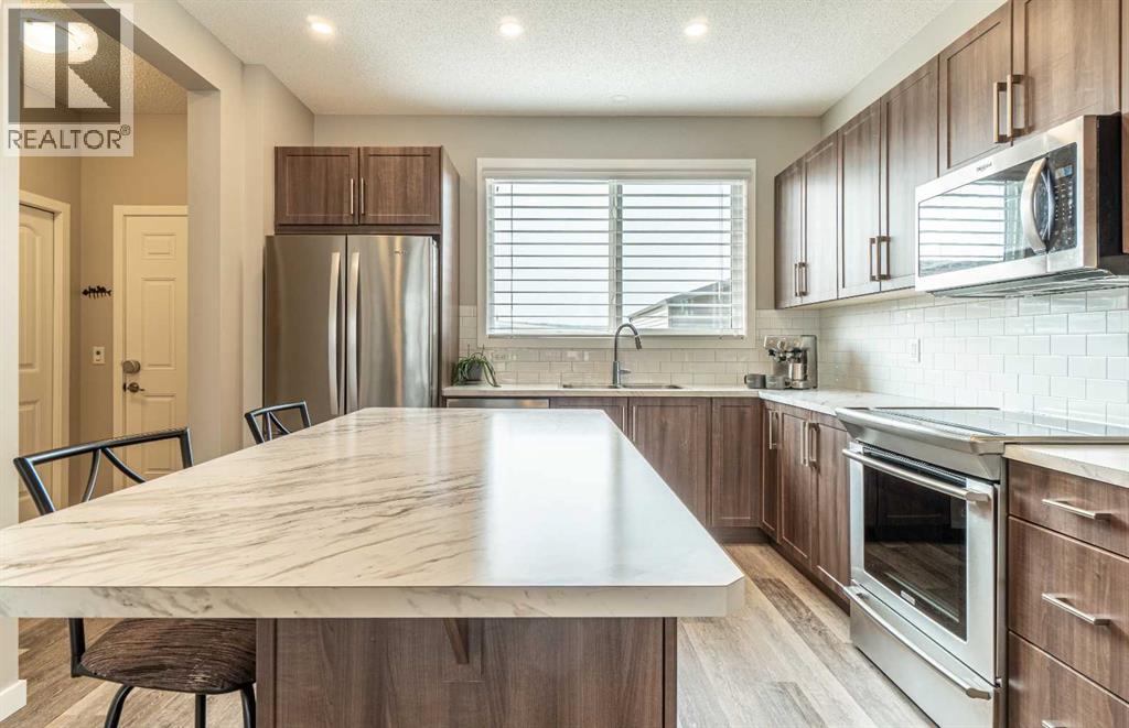 290 Belmont Heath Sw, Calgary, Alberta  T2X 4N3 - Photo 5 - A2252646