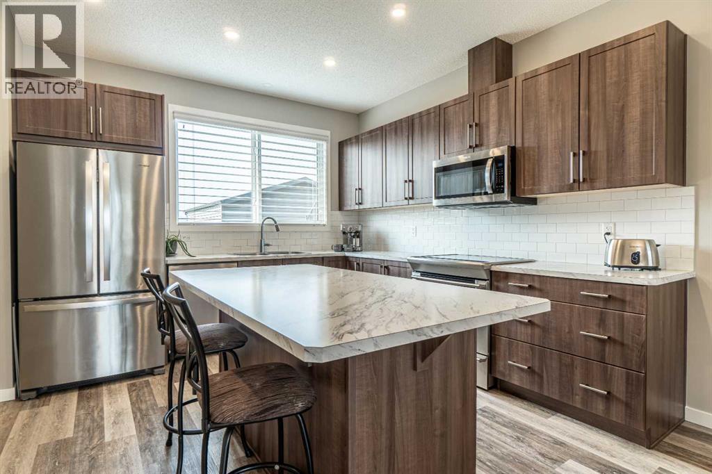 290 Belmont Heath Sw, Calgary, Alberta  T2X 4N3 - Photo 3 - A2252646