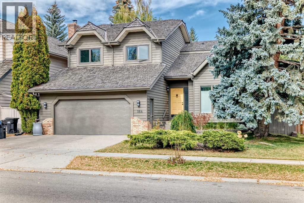 164 Woodfield Road Sw, Calgary, Alberta  T2W 3V9 - Photo 1 - A2261675