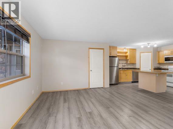 106, 8 Everridge Square Sw, Calgary, Alberta  T2Y 5J7 - Photo 5 - A2249649