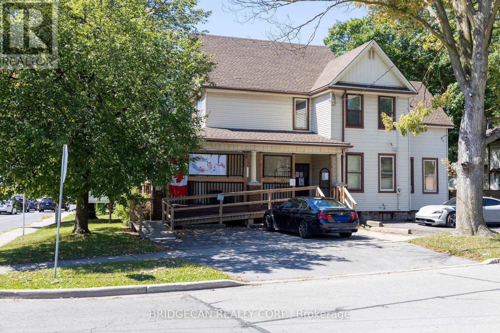 7 Welland Avenue, St. Catharines (Downtown), Ontario  L2R 2L8 - Photo 1 - X12447676