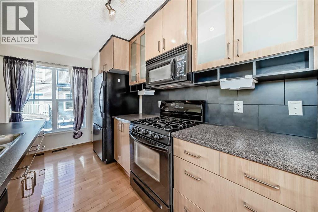 63 Toscana Gardens Nw, Calgary, Alberta  T3L 3C2 - Photo 9 - A2262533