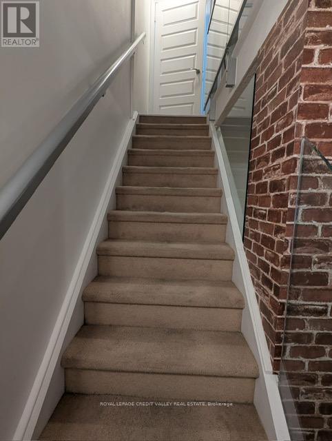 221 - 215 Queen Street, Brampton, Ontario  L6W 0A9 - Photo 2 - W12447365