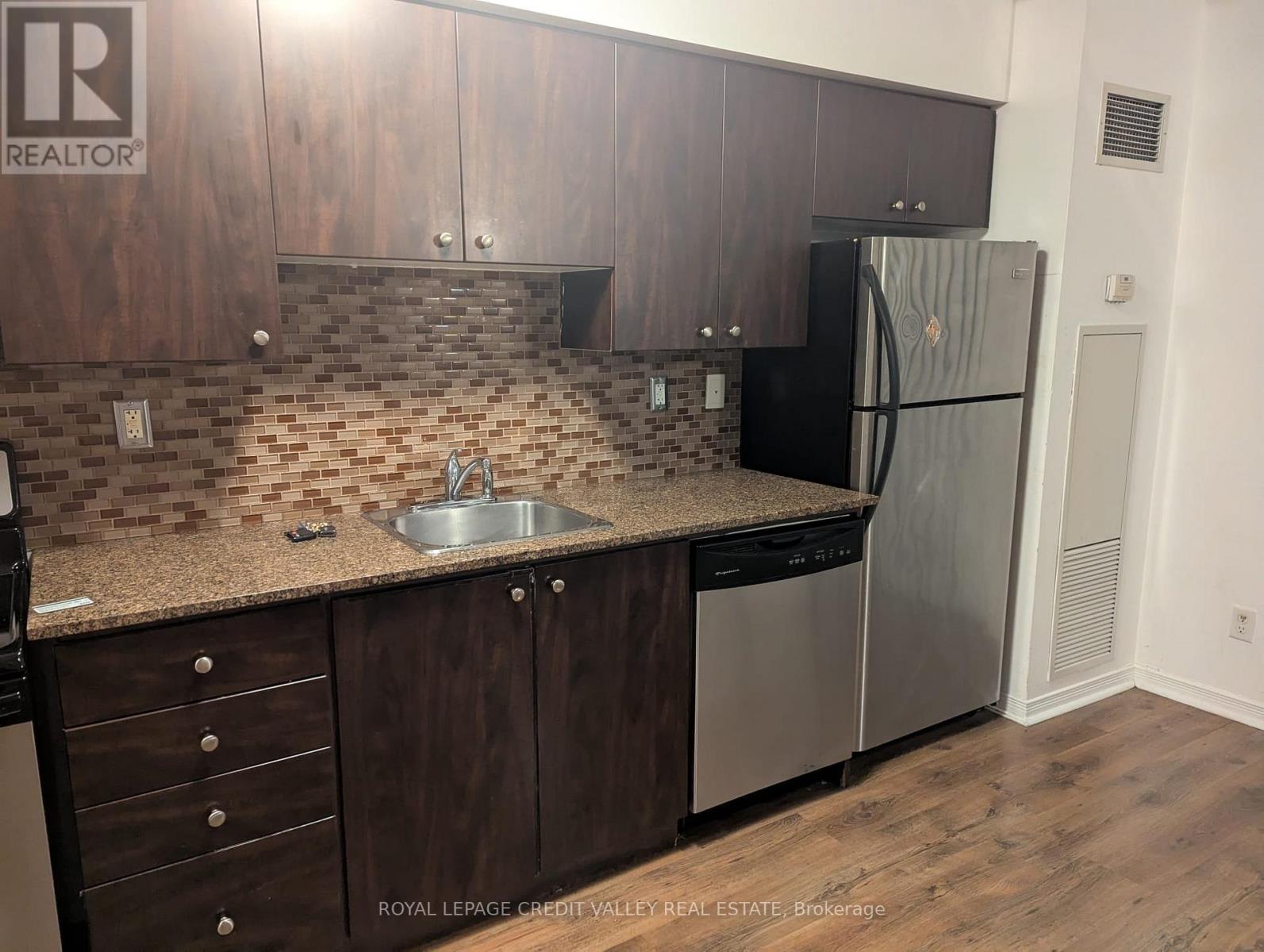 221 - 215 Queen Street, Brampton, Ontario  L6W 0A9 - Photo 10 - W12447365
