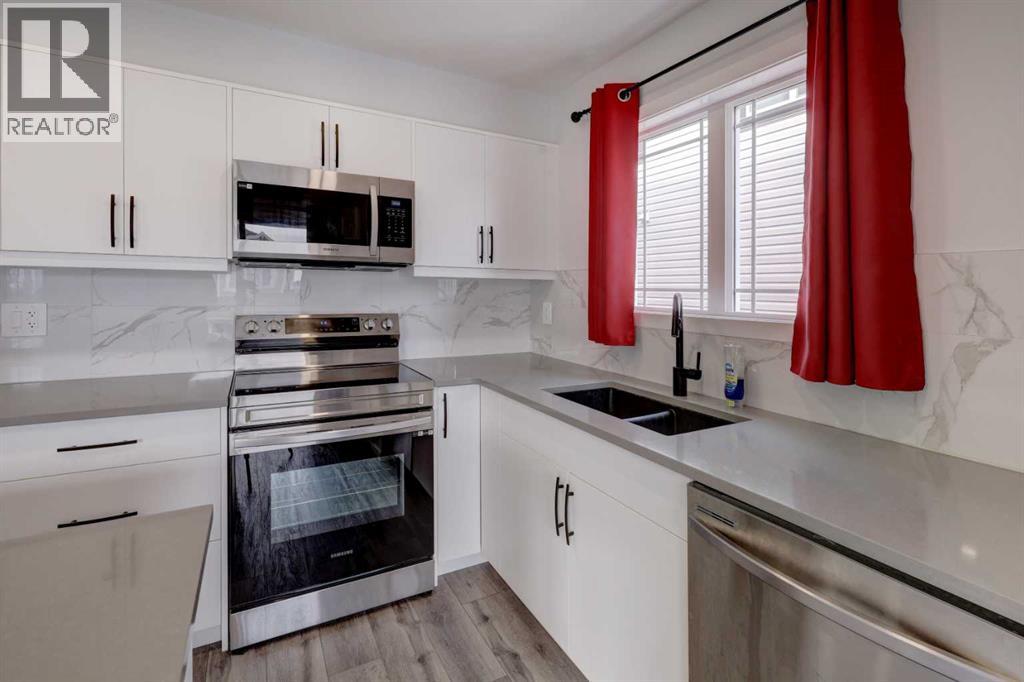 827 Windbury Street Sw, Airdrie, Alberta  T4B 3T1 - Photo 4 - A2259537
