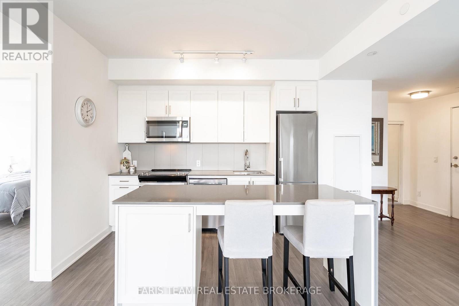 311 - 681 Yonge Street, Barrie (Painswick South), Ontario  L4N 4E8 - Photo 4 - S12447874
