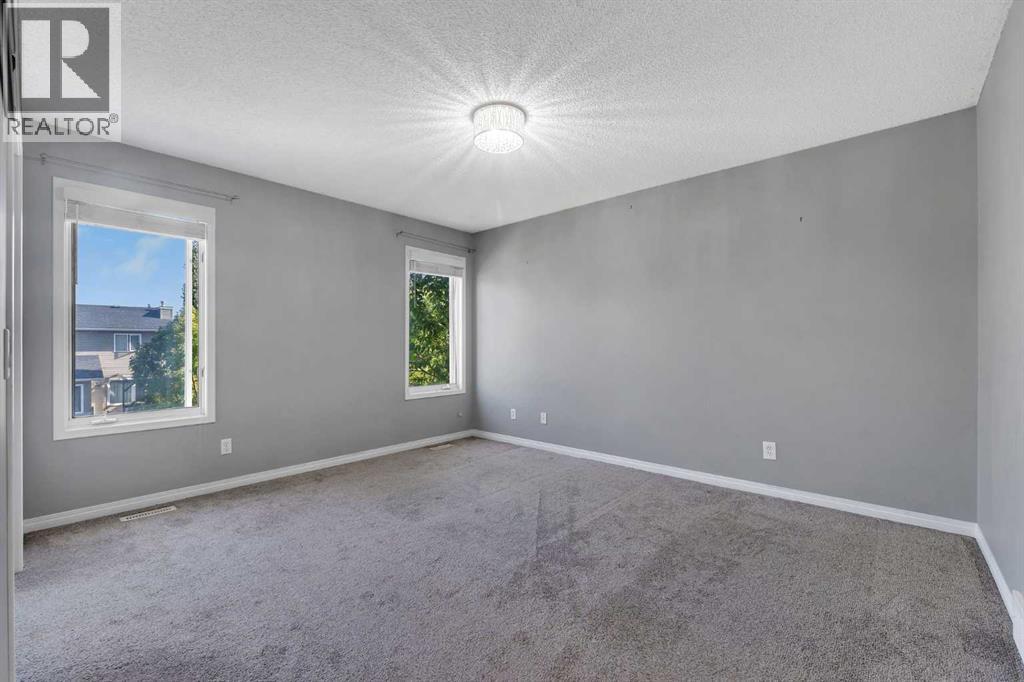 22 Cimarron Crescent, Okotoks, Alberta  T1S 1S7 - Photo 20 - A2261621