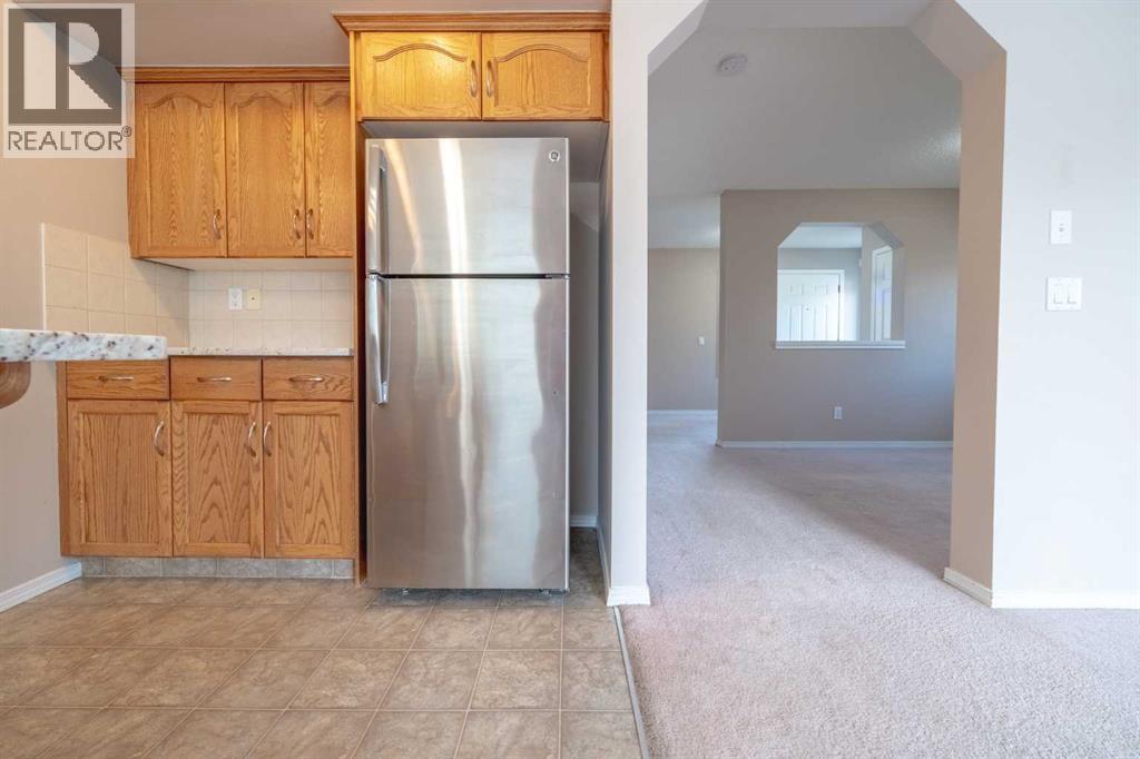 91 Cougartown Close Sw, Calgary, Alberta  T3H 0B3 - Photo 7 - A2257417