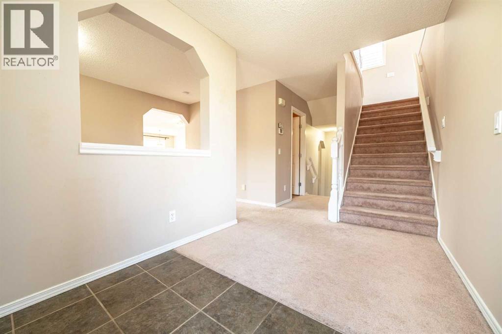 91 Cougartown Close Sw, Calgary, Alberta  T3H 0B3 - Photo 3 - A2257417