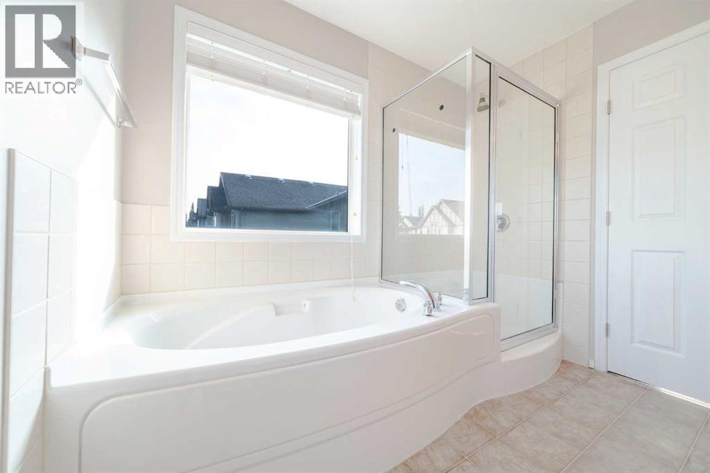 91 Cougartown Close Sw, Calgary, Alberta  T3H 0B3 - Photo 19 - A2257417