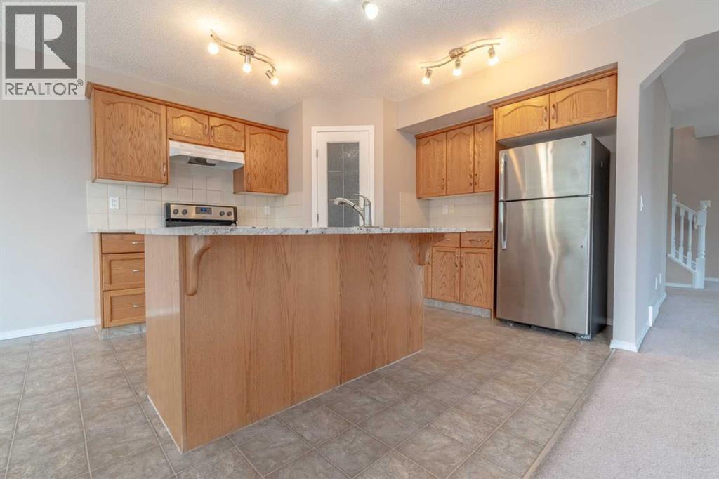 91 Cougartown Close Sw, Calgary, Alberta  T3H 0B3 - Photo 6 - A2257417