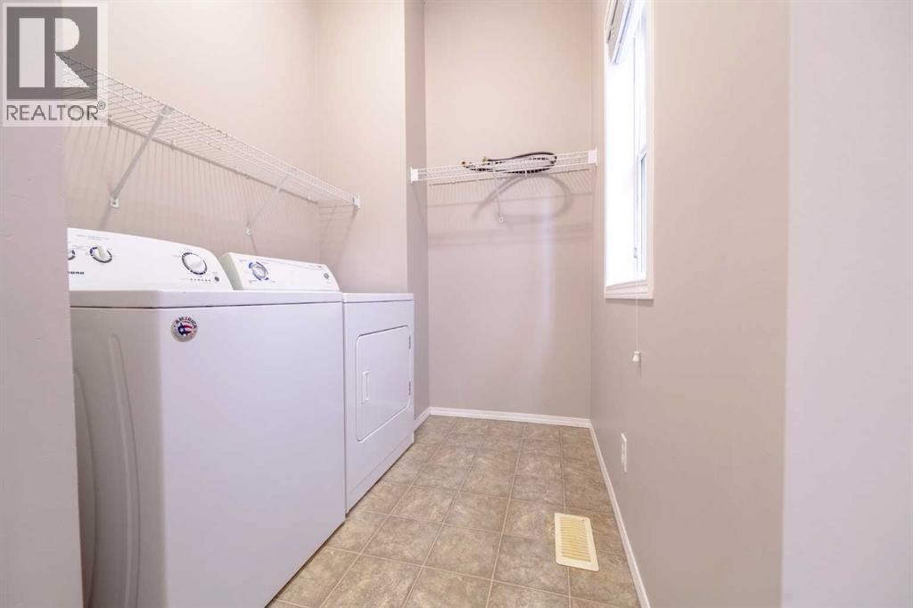 91 Cougartown Close Sw, Calgary, Alberta  T3H 0B3 - Photo 11 - A2257417