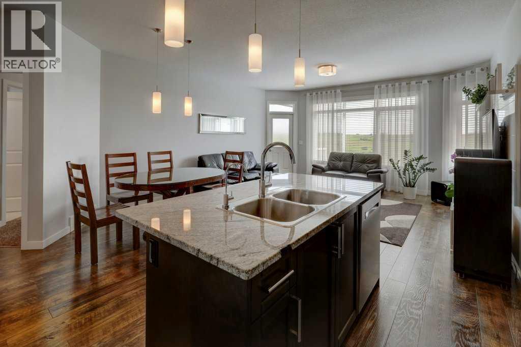 2084 Ravensdun Crescent Se, Airdrie, Alberta  T4A 3K2 - Photo 6 - A2246078