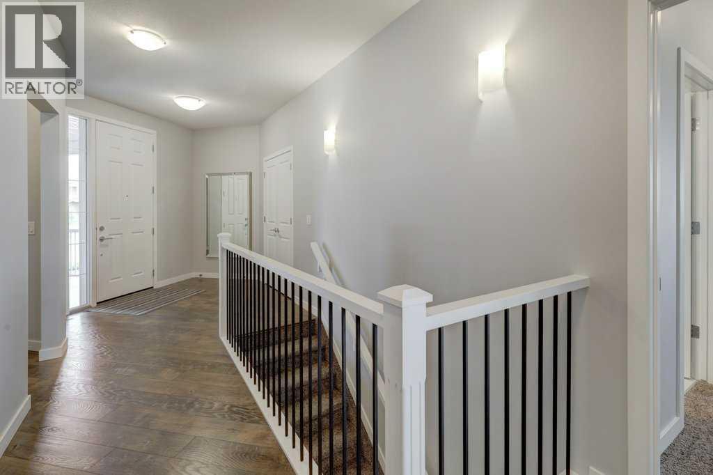 2084 Ravensdun Crescent Se, Airdrie, Alberta  T4A 3K2 - Photo 3 - A2246078