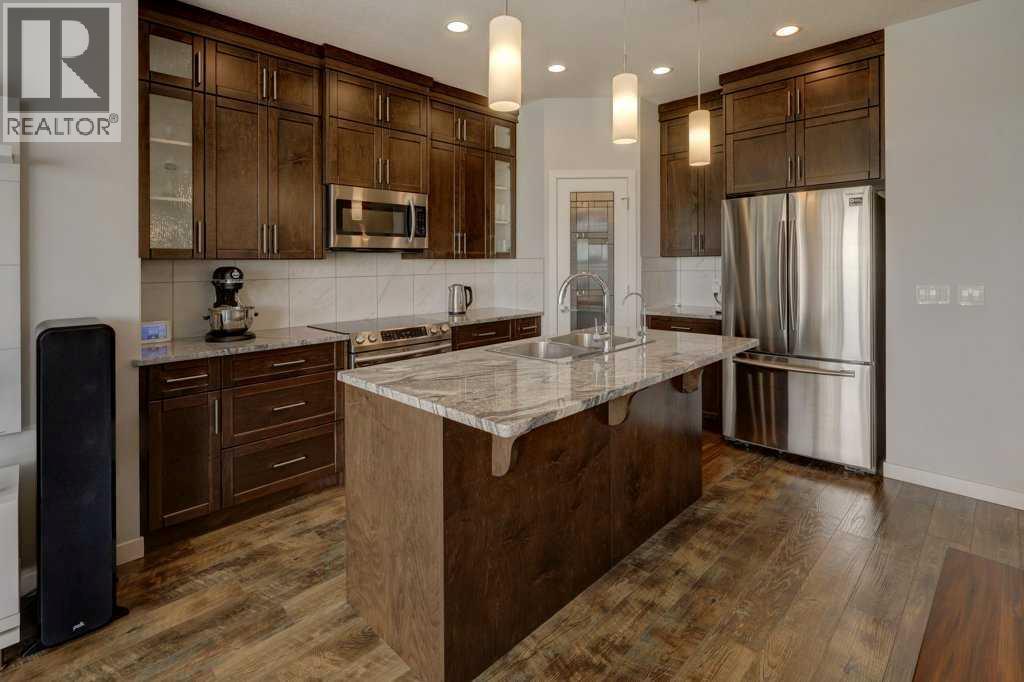 2084 Ravensdun Crescent Se, Airdrie, Alberta  T4A 3K2 - Photo 4 - A2246078