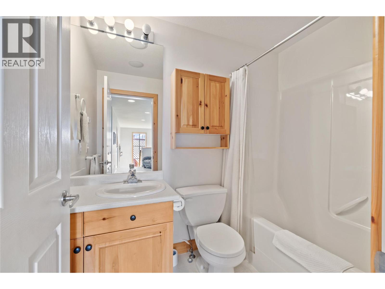 5946 Snow Pines Crescent Unit# A Big White Photo 29