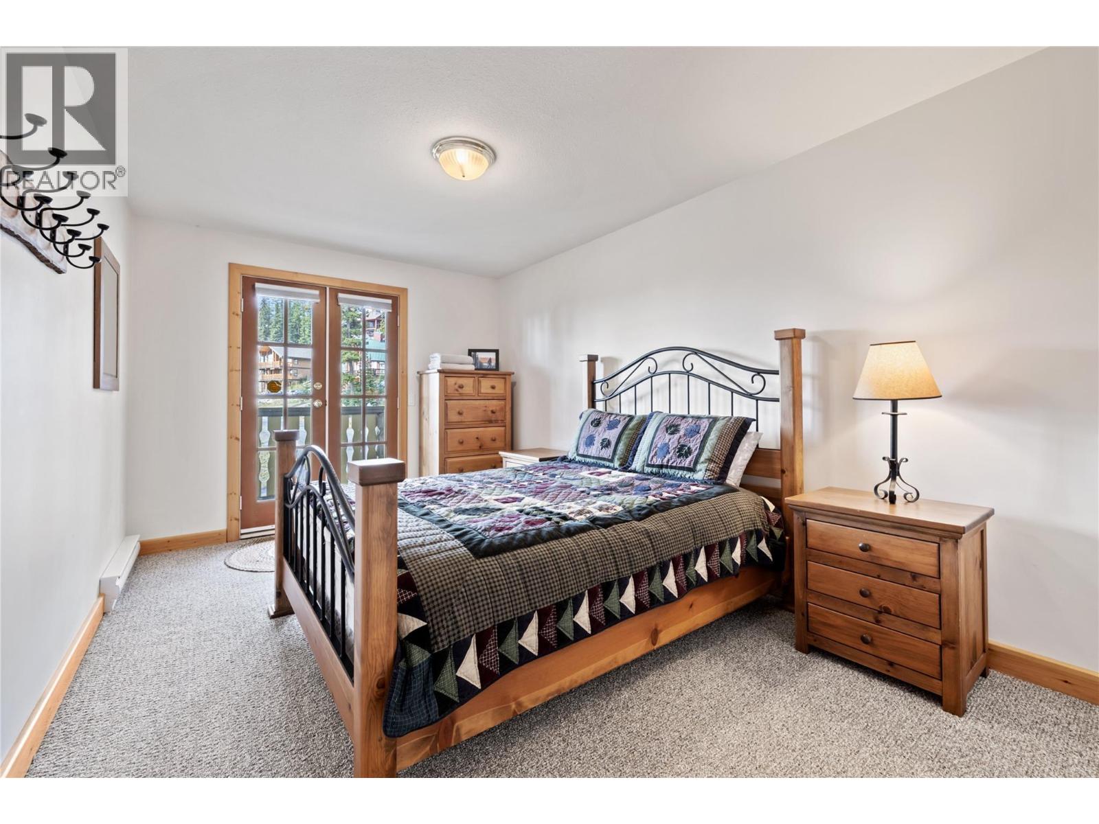 5946 Snow Pines Crescent Unit# A Big White Photo 30