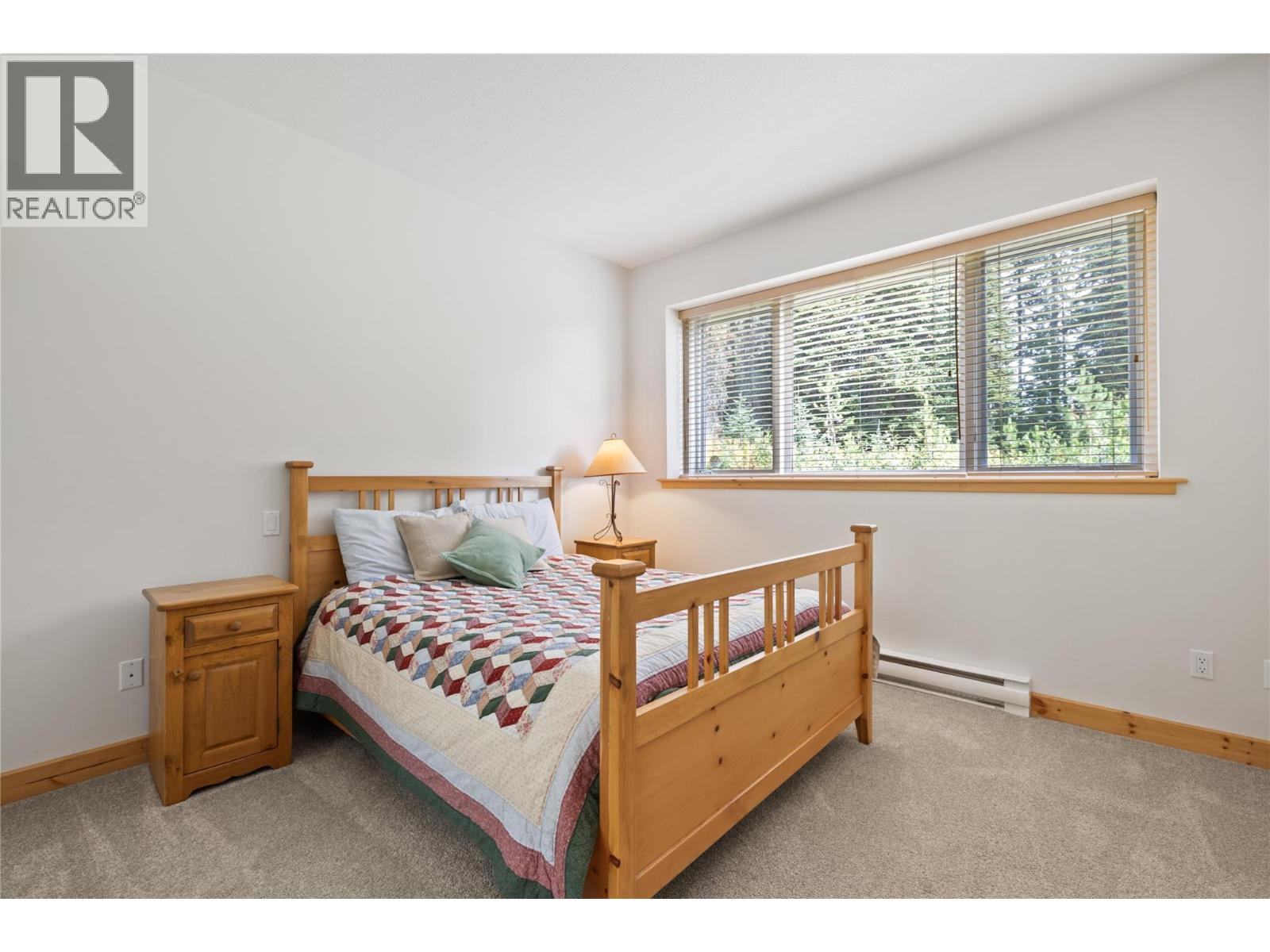 5946 Snow Pines Crescent Unit# A Big White Photo 41