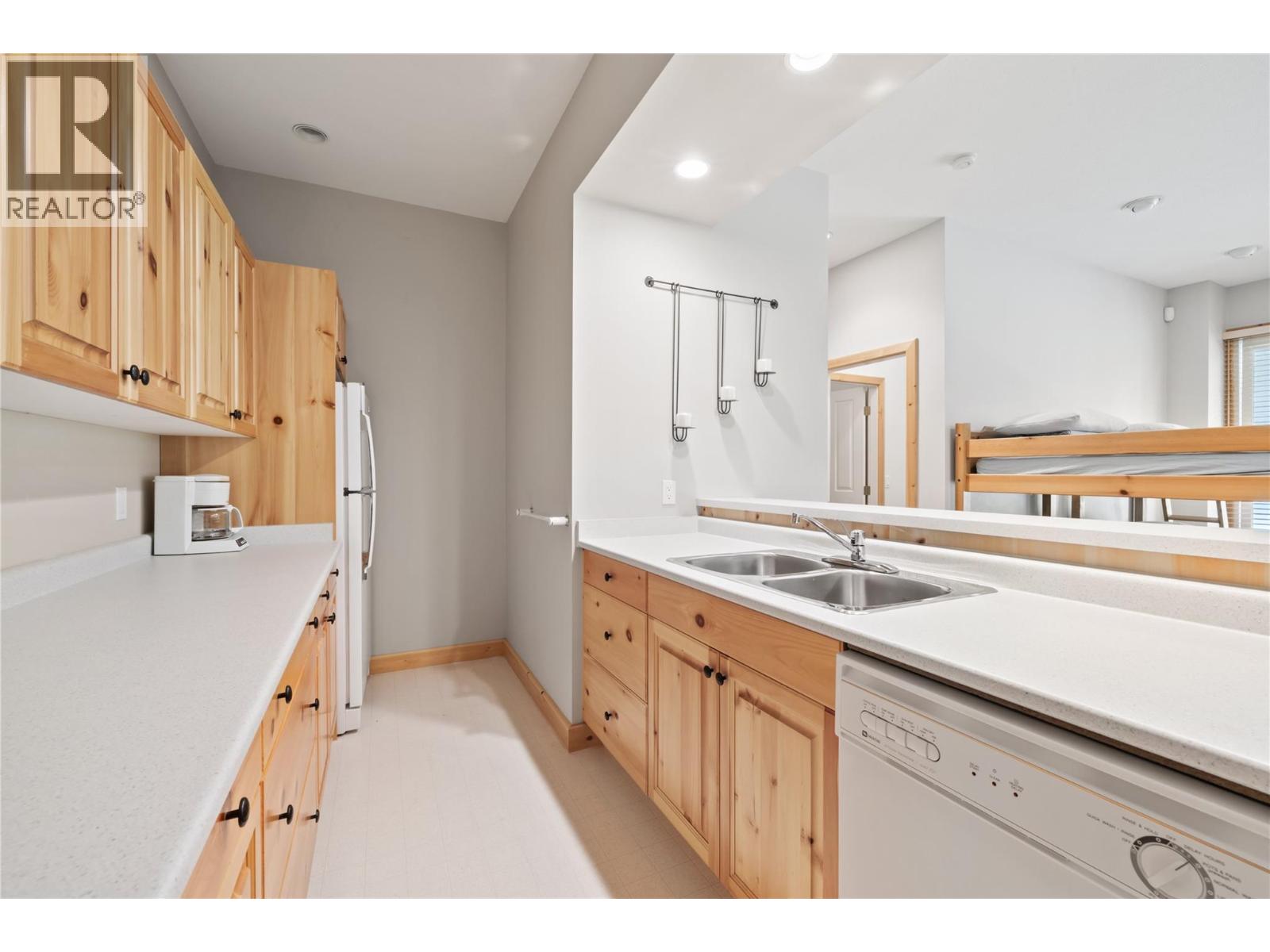 5946 Snow Pines Crescent Unit# A Big White Photo 37