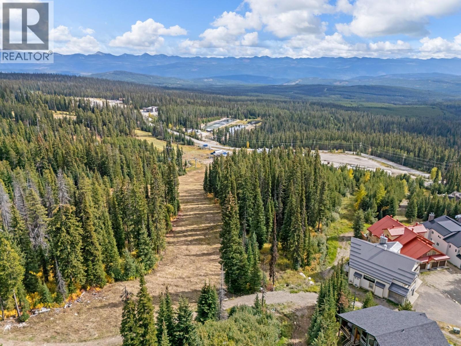 5946 Snow Pines Crescent Unit# A Big White Photo 48