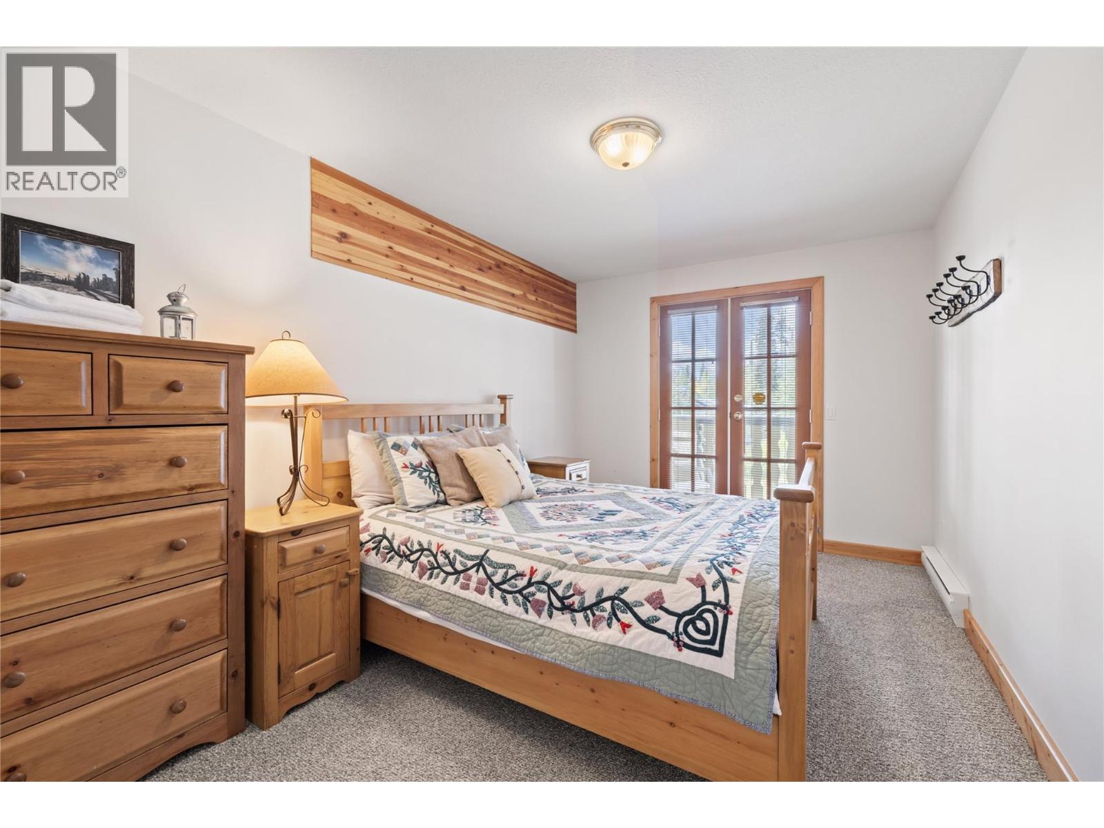 5946 Snow Pines Crescent Unit# A Big White Photo 32