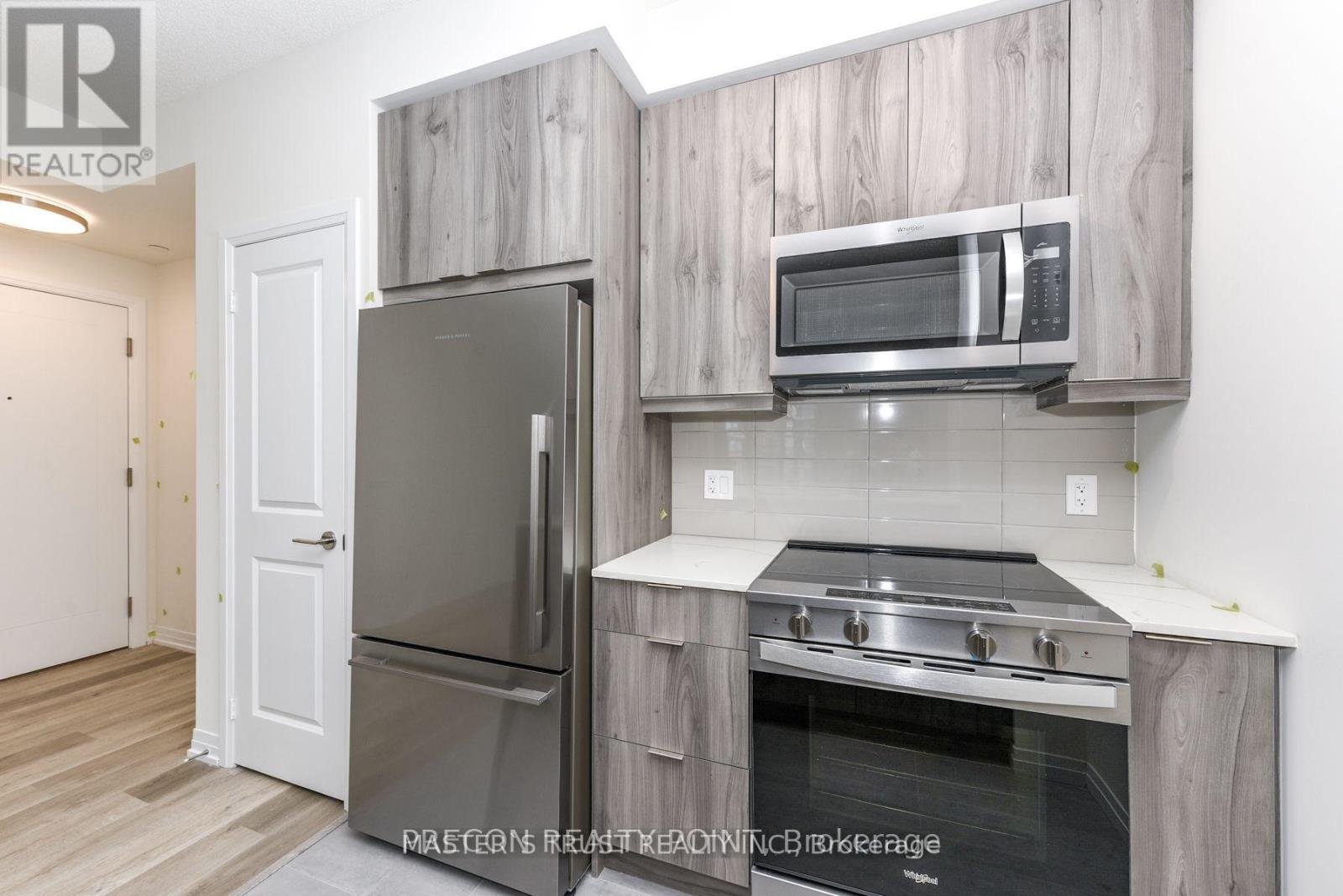 1305 - 15 Watergarden Drive, Mississauga, Ontario  L5R 1B2 - Photo 4 - W12448042