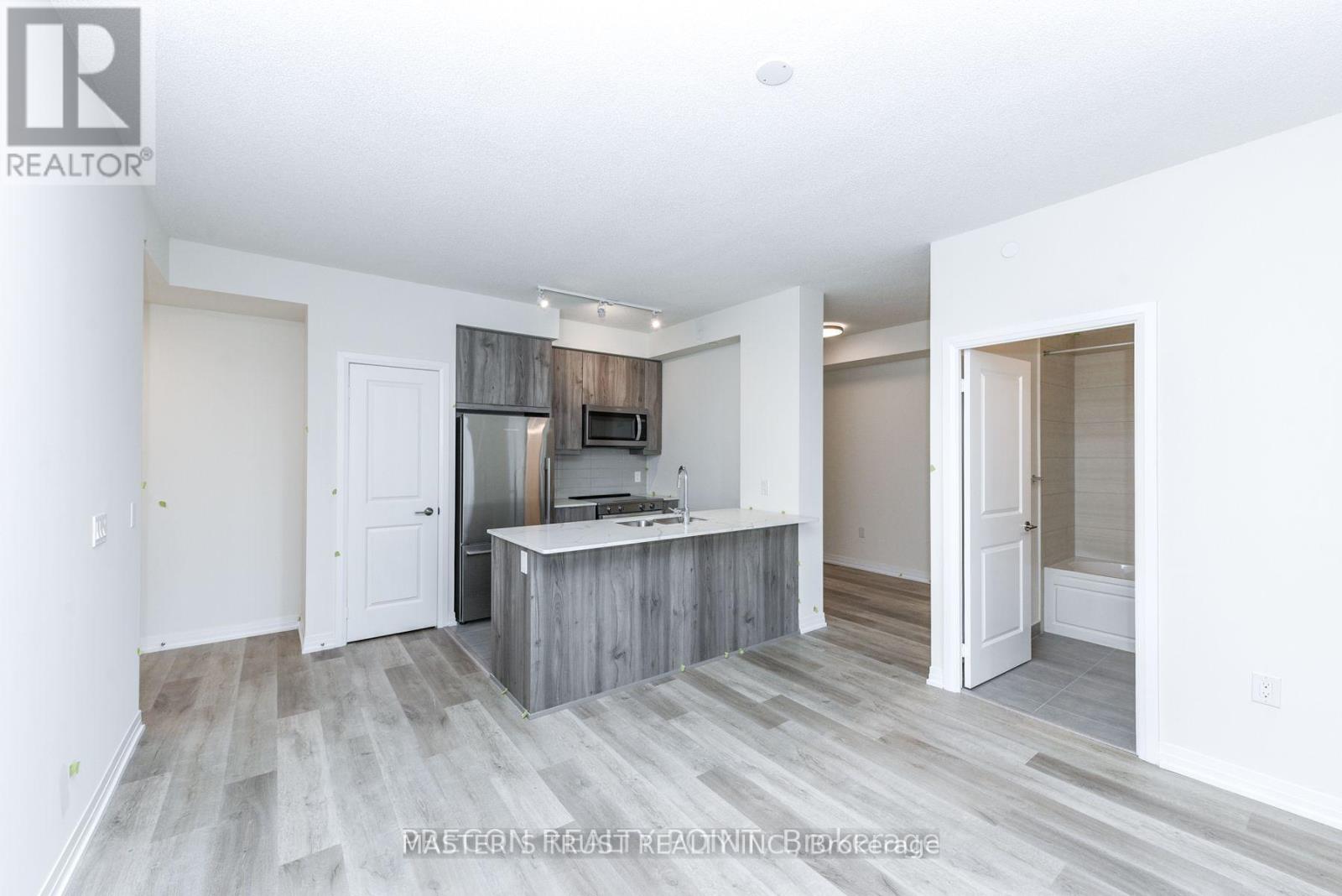 1305 - 15 Watergarden Drive, Mississauga, Ontario  L5R 1B2 - Photo 5 - W12448042