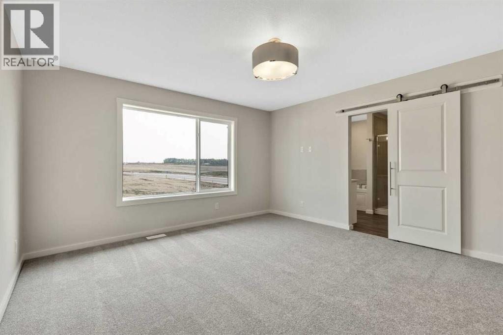 19 Heritage Link, Cochrane, Alberta  T4C 2J8 - Photo 12 - A2260882