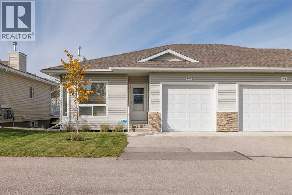 145 Ridgestone Lane, Diamond Valley, Alberta  T0L 0H0 - Photo 1 - A2262234