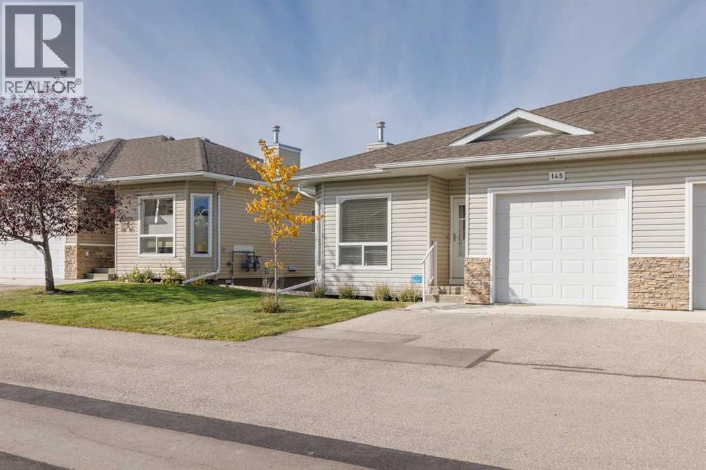 145 Ridgestone Lane, Diamond Valley, Alberta  T0L 0H0 - Photo 2 - A2262234