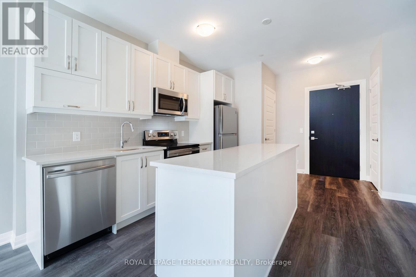 303 - 102 Grovewood Common, Oakville, Ontario  L6H 0X2 - Photo 3 - W12448192