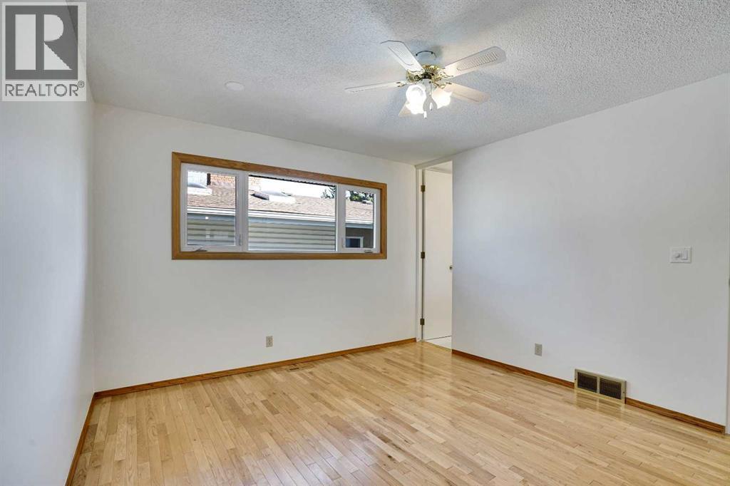 2719 Cedar Ridge Drive Sw, Calgary, Alberta  T2W 1X5 - Photo 19 - A2261869