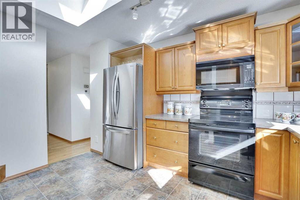 2719 Cedar Ridge Drive Sw, Calgary, Alberta  T2W 1X5 - Photo 14 - A2261869