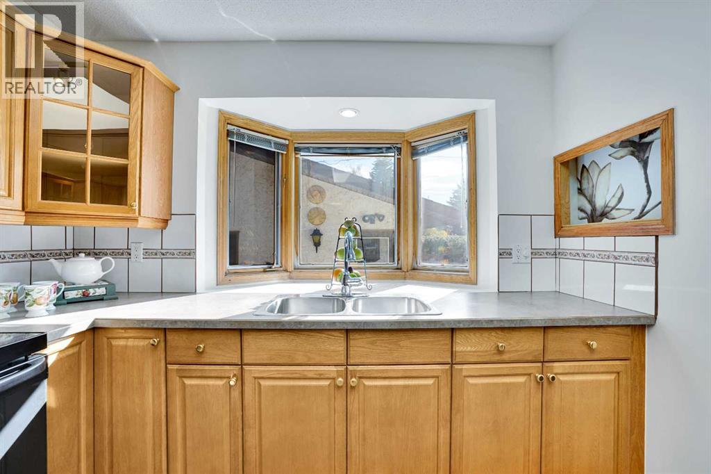 2719 Cedar Ridge Drive Sw, Calgary, Alberta  T2W 1X5 - Photo 15 - A2261869
