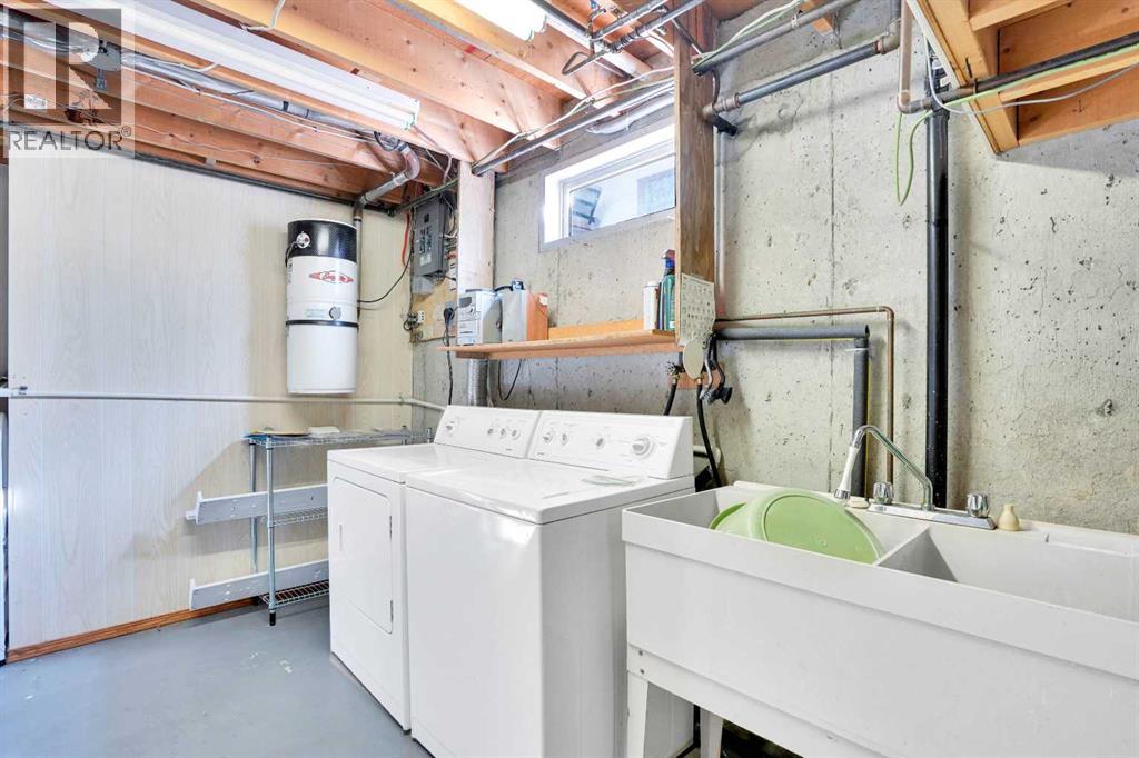 2719 Cedar Ridge Drive Sw, Calgary, Alberta  T2W 1X5 - Photo 40 - A2261869