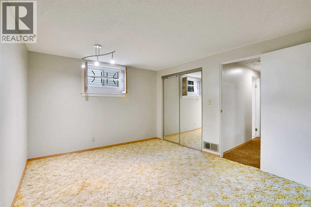 2719 Cedar Ridge Drive Sw, Calgary, Alberta  T2W 1X5 - Photo 31 - A2261869