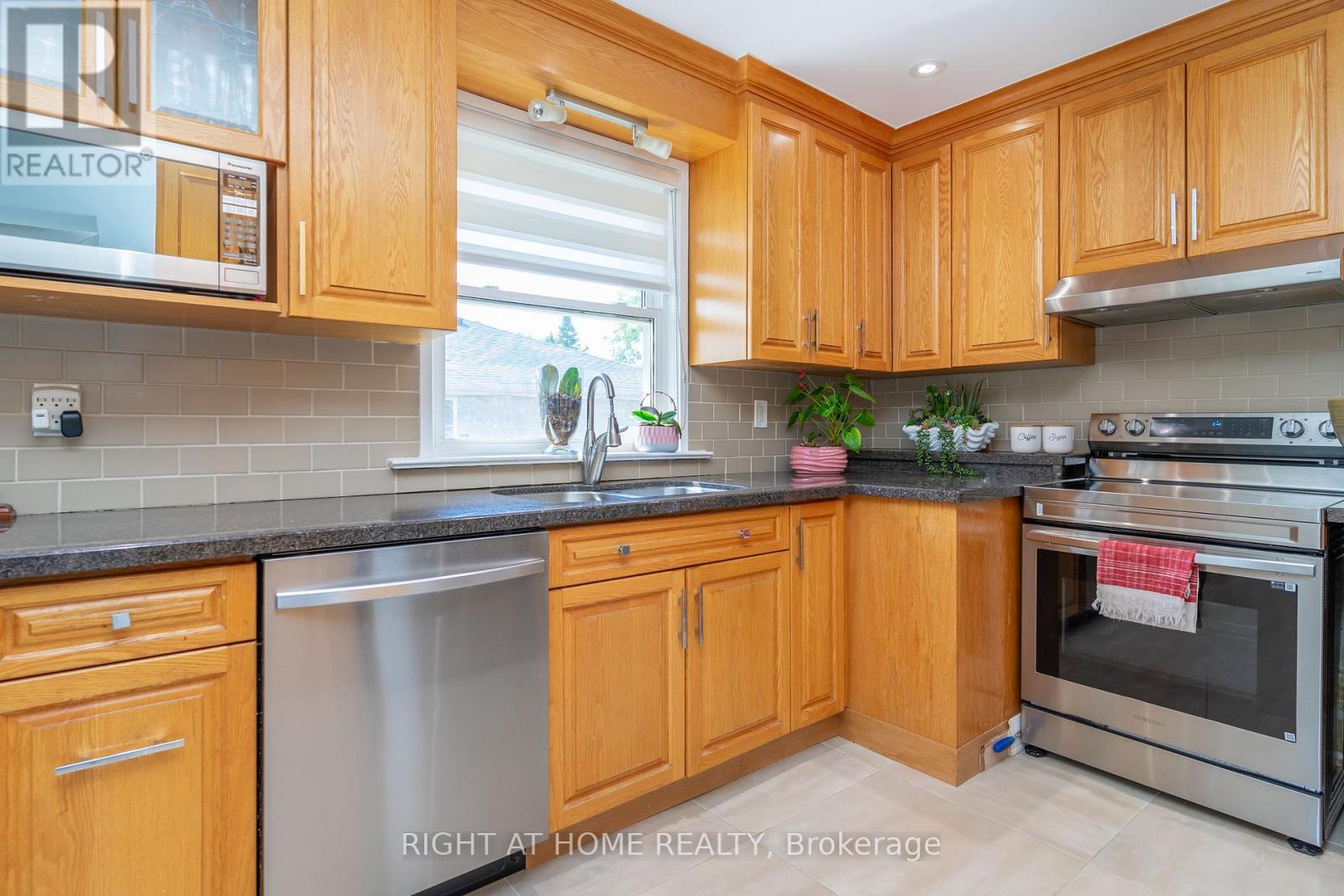 63 Allonsius Drive, Toronto, Ontario  M9C 3N6 - Photo 9 - W12448210