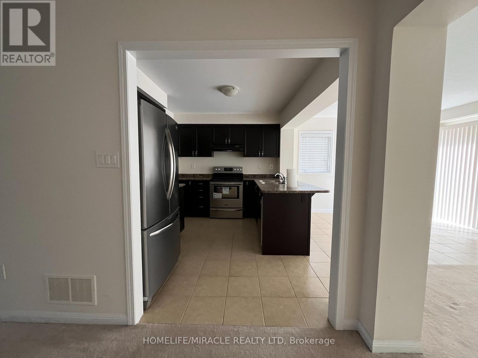 41 Ganton Heights, Brampton, Ontario  L7A 3Y8 - Photo 7 - W12448347