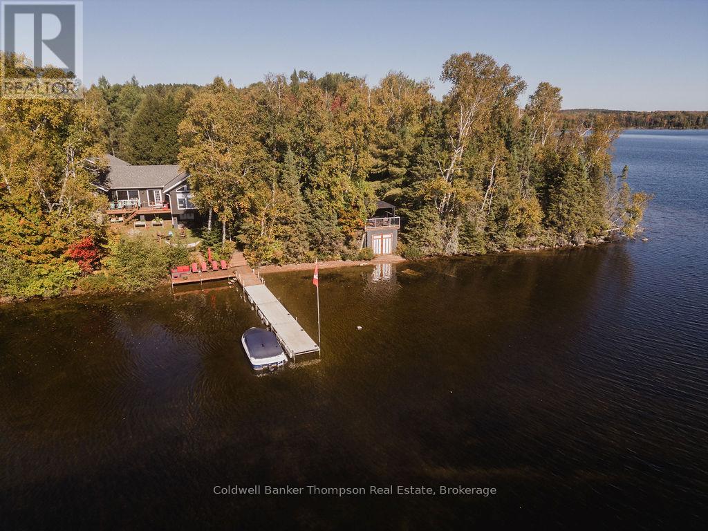 <div class="slider-price">$1,199,900</div><p>47 Machar Crescent, Machar, Ontario</p>