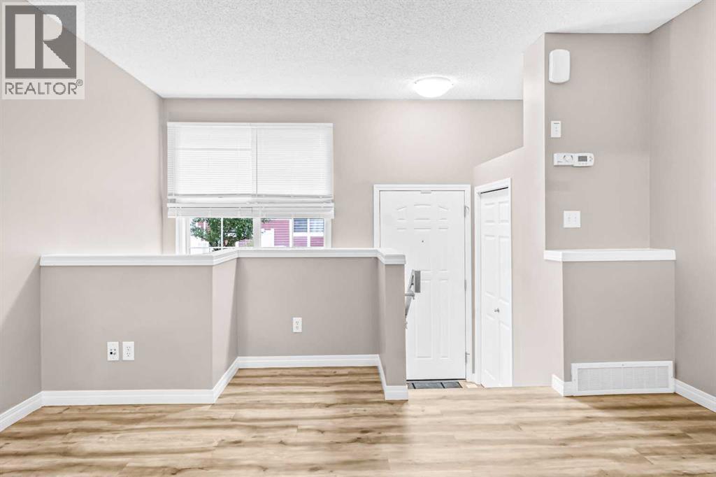 3232 New Brighton Gardens Se, Calgary, Alberta  T2Z 0A3 - Photo 5 - A2241665