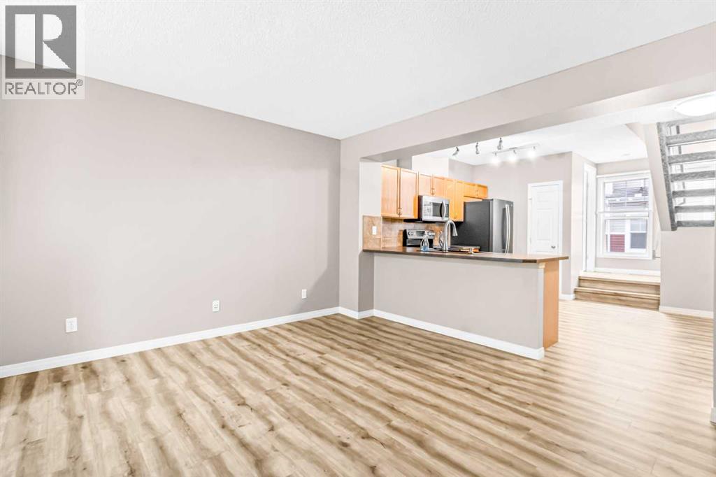 3232 New Brighton Gardens Se, Calgary, Alberta  T2Z 0A3 - Photo 7 - A2241665