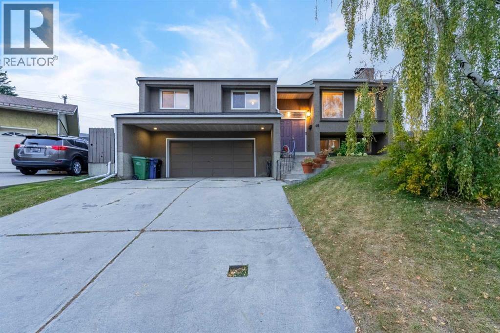 48 Thornwood Close Nw, Calgary, Alberta  T2K 5K3 - Photo 3 - A2262334