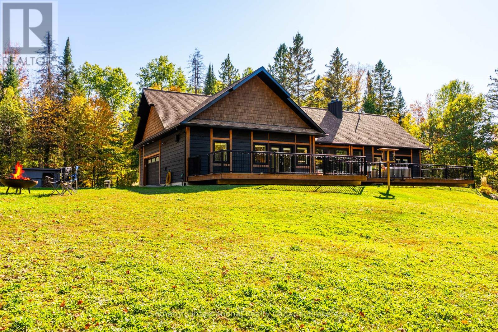 64 Bowyer Road, Huntsville (Chaffey), Ontario  P1H 2J4 - Photo 7 - X12448426