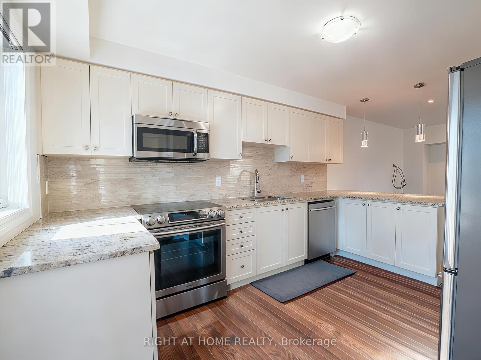 337 Ellen Davidson Drive, Oakville, Ontario  L6M 0V6 - Photo 5 - W12448424