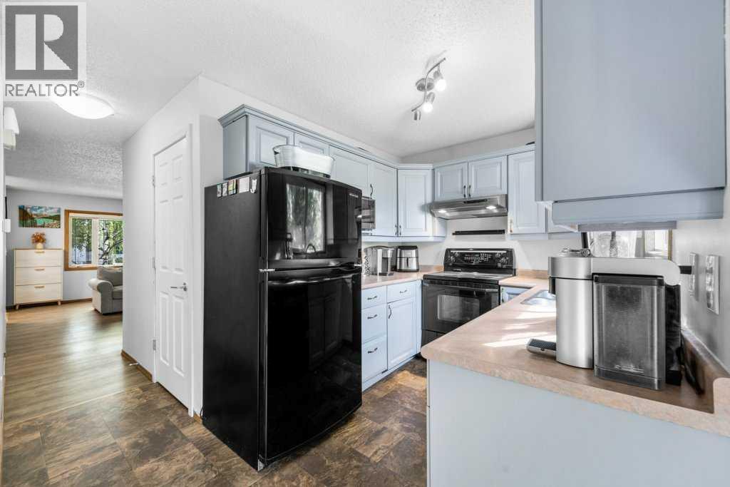 488 Bracewood Crescent Sw, Calgary, Alberta  T2W 3B8 - Photo 11 - A2261944