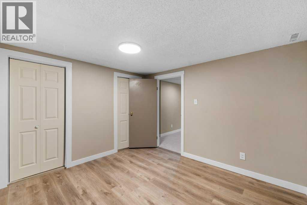 488 Bracewood Crescent Sw, Calgary, Alberta  T2W 3B8 - Photo 35 - A2261944