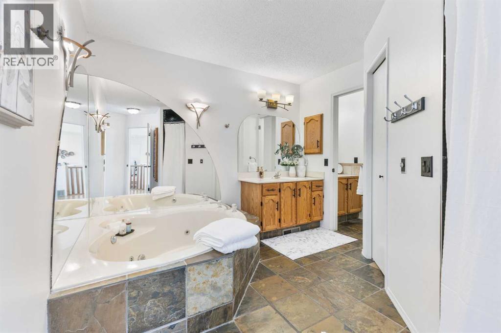 2 Riverside Place, Cochrane, Alberta  T4C 1J6 - Photo 27 - A2255683