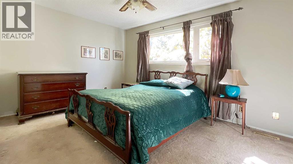 32 Deerfield Drive Se, Calgary, Alberta  T2J 6M1 - Photo 9 - A2260574