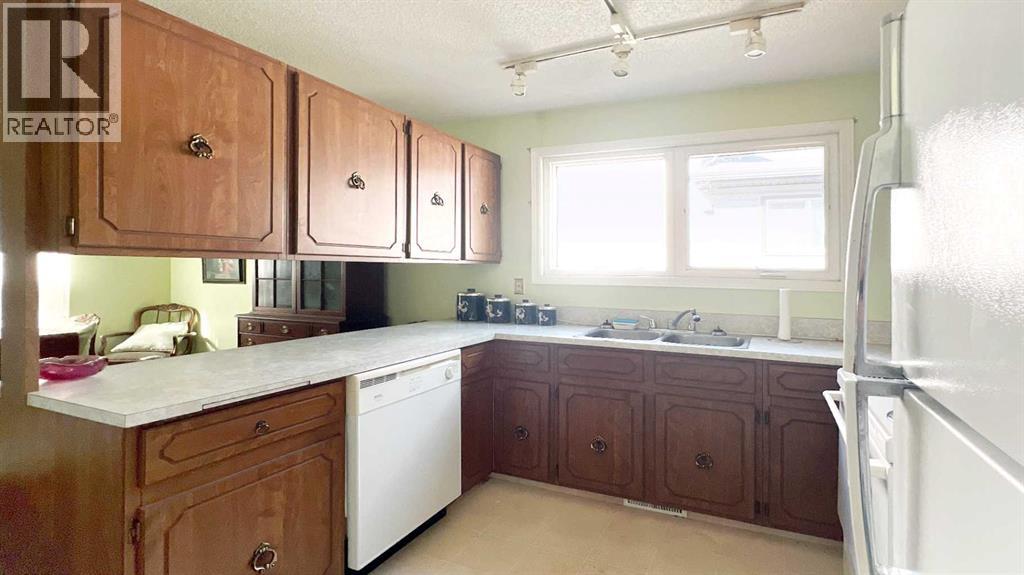 32 Deerfield Drive Se, Calgary, Alberta  T2J 6M1 - Photo 7 - A2260574