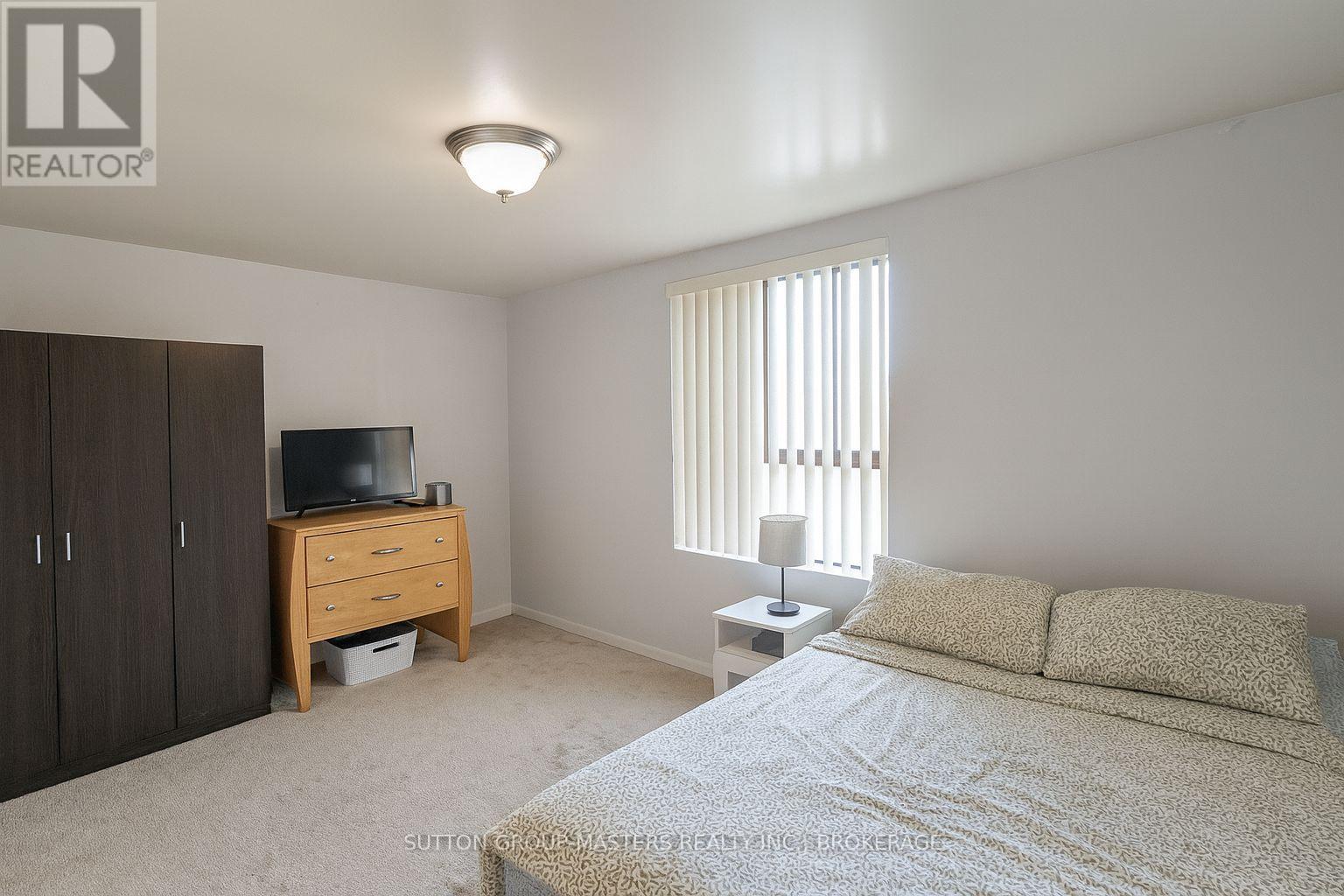404 - 334 Queen Mary Road, Kingston, Ontario  K7M 7E7 - Photo 13 - X12448704